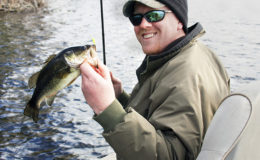 large mouth bass caught in a boat